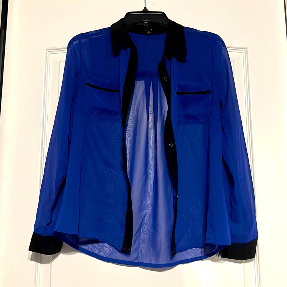 Size small. Sheer blue blouse.